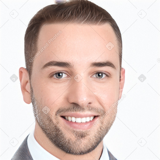 Joyful white young-adult male with short  brown hair and grey eyes