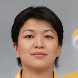 Neutral asian young-adult female with medium  brown hair and brown eyes