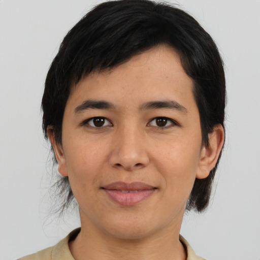 Joyful asian young-adult female with medium  black hair and brown eyes