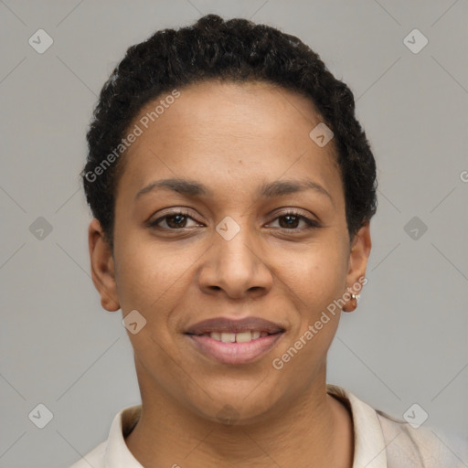 Joyful latino young-adult female with short  black hair and brown eyes