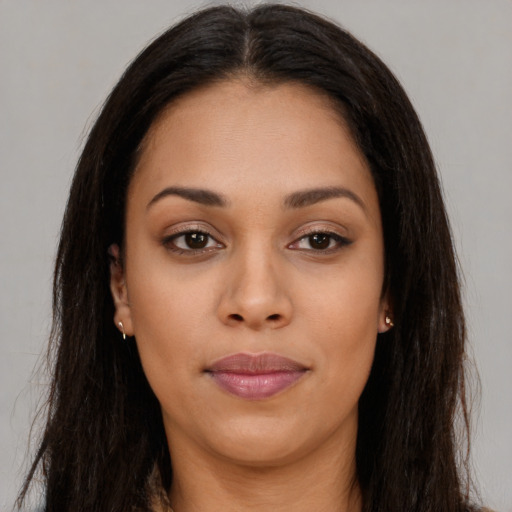 Joyful asian young-adult female with long  brown hair and brown eyes