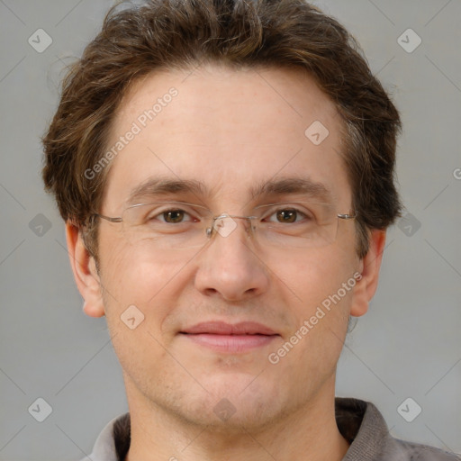 Joyful white adult male with short  brown hair and grey eyes