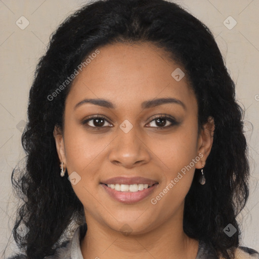 Joyful black young-adult female with long  black hair and brown eyes