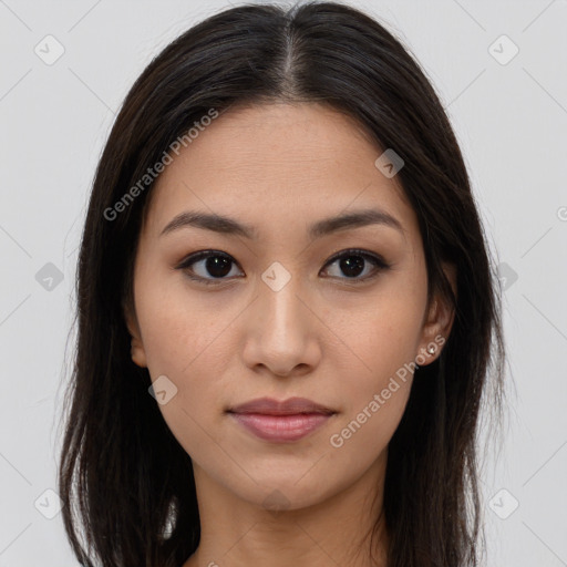 Joyful asian young-adult female with long  brown hair and brown eyes