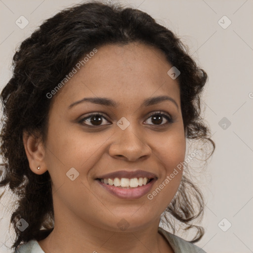 Joyful black young-adult female with medium  brown hair and brown eyes