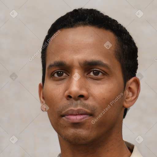 Neutral black young-adult male with short  black hair and brown eyes