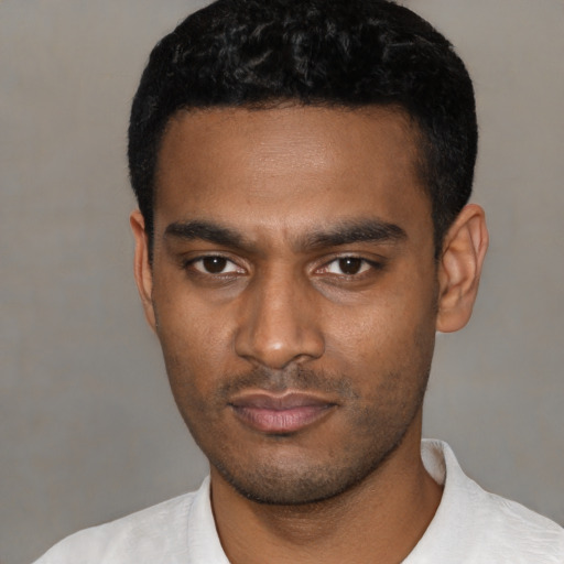 Neutral latino young-adult male with short  black hair and brown eyes