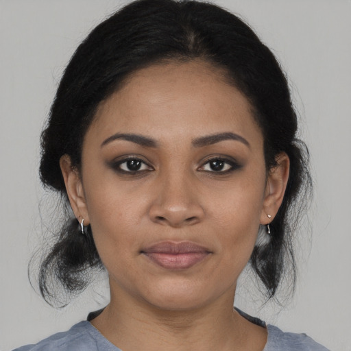 Joyful asian young-adult female with medium  black hair and brown eyes