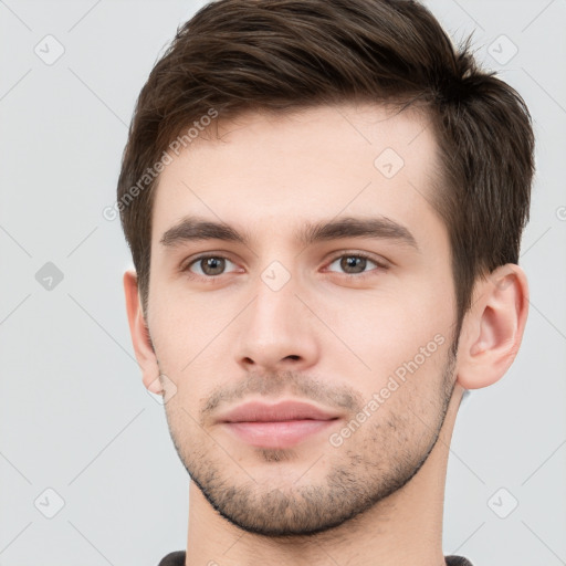 Neutral white young-adult male with short  brown hair and brown eyes