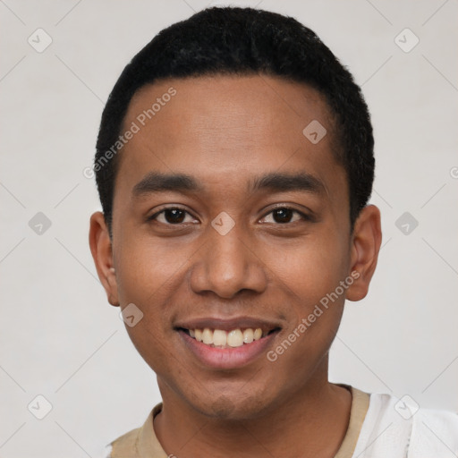 Joyful latino young-adult male with short  black hair and brown eyes