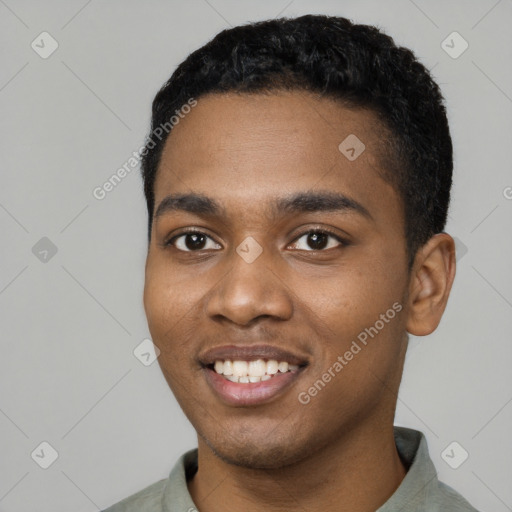 Joyful black young-adult male with short  black hair and brown eyes