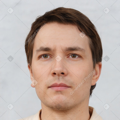 Neutral white young-adult male with short  brown hair and brown eyes