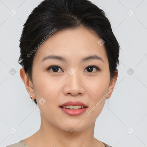 Joyful asian young-adult female with short  black hair and brown eyes