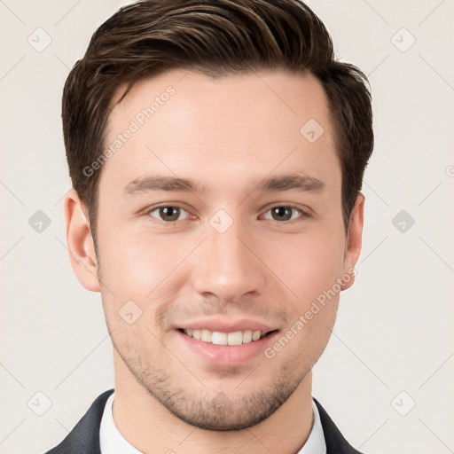 Joyful white young-adult male with short  brown hair and brown eyes