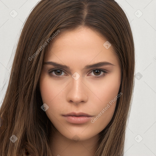 Neutral white young-adult female with long  brown hair and brown eyes