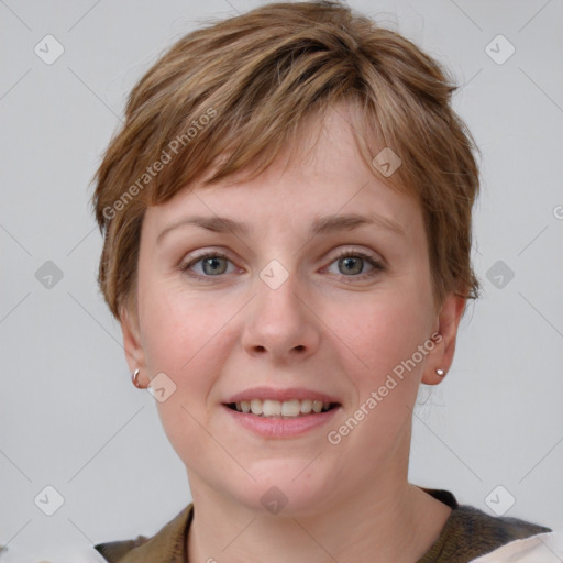 Joyful white young-adult female with short  brown hair and grey eyes