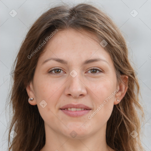 Joyful white young-adult female with long  brown hair and grey eyes