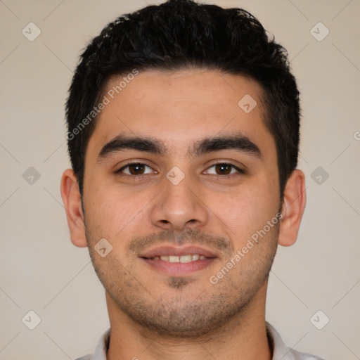 Joyful white young-adult male with short  black hair and brown eyes