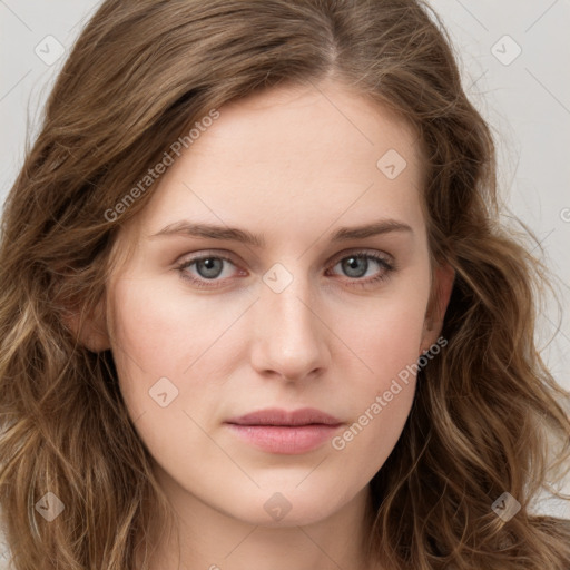 Joyful white young-adult female with long  brown hair and green eyes