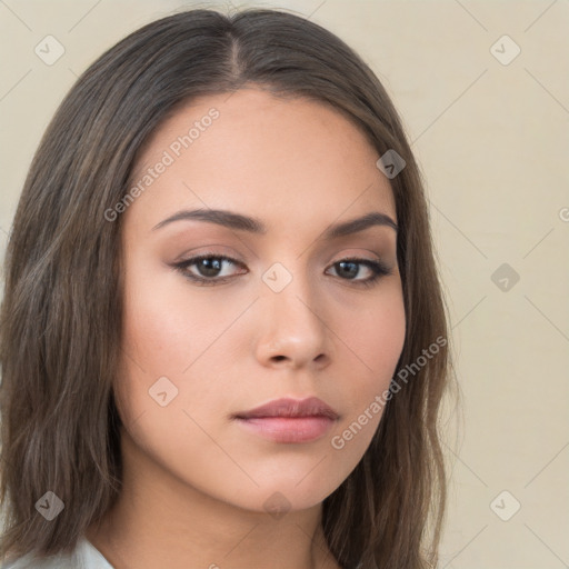 Neutral white young-adult female with long  brown hair and brown eyes