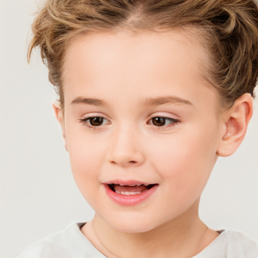 Joyful white child female with short  brown hair and brown eyes