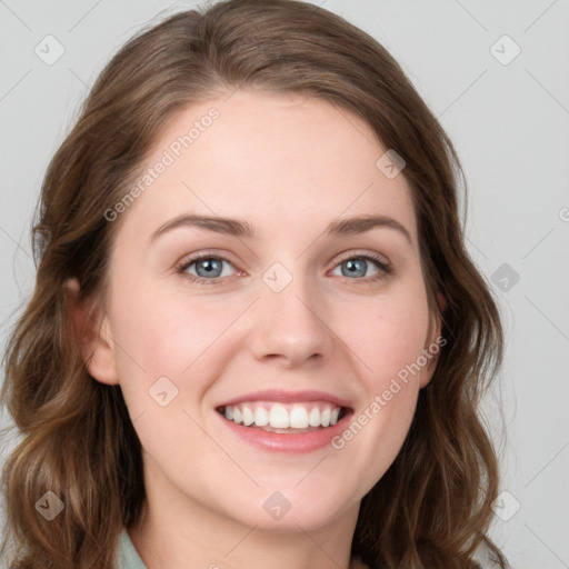 Joyful white young-adult female with long  brown hair and grey eyes