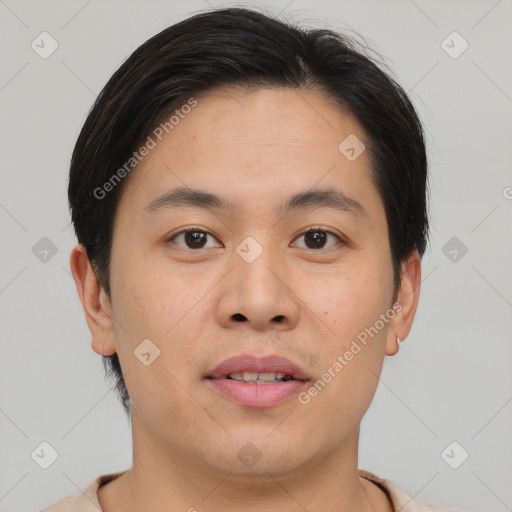 Joyful asian young-adult male with short  brown hair and brown eyes