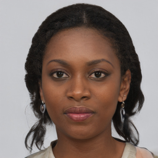 Neutral black young-adult female with long  black hair and brown eyes