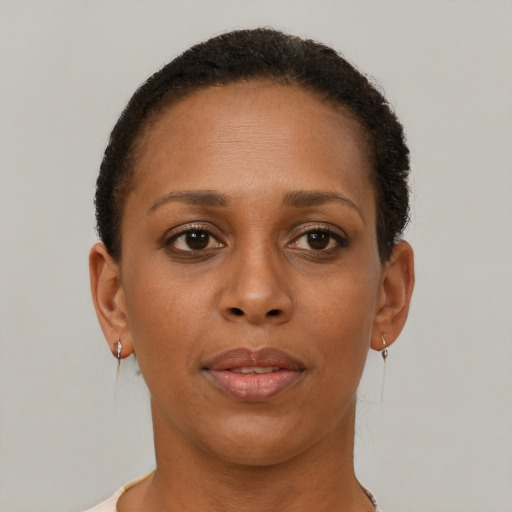 Neutral black young-adult female with short  brown hair and brown eyes