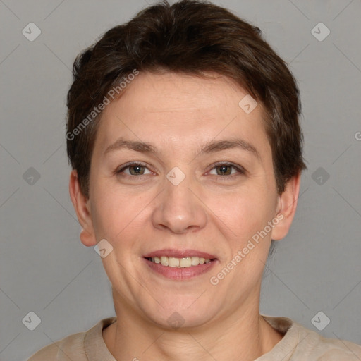 Joyful white adult female with short  brown hair and grey eyes