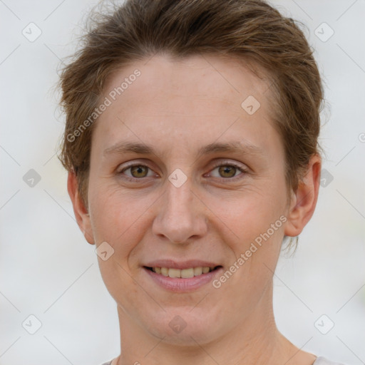 Joyful white young-adult female with short  brown hair and grey eyes