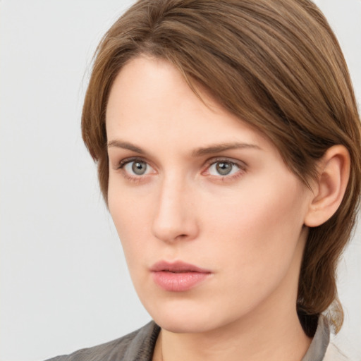 Neutral white young-adult female with medium  brown hair and grey eyes