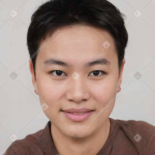 Joyful asian young-adult male with short  brown hair and brown eyes