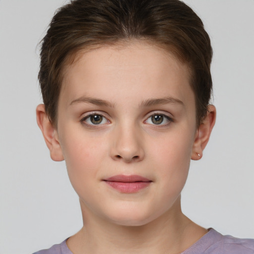 Joyful white child female with short  brown hair and brown eyes