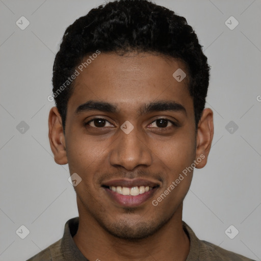 Joyful black young-adult male with short  black hair and brown eyes