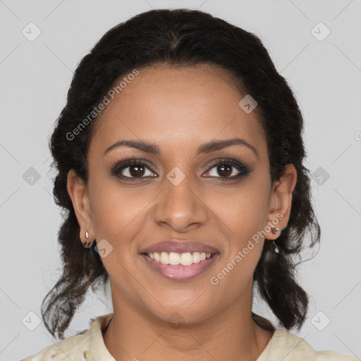 Joyful black young-adult female with medium  brown hair and brown eyes