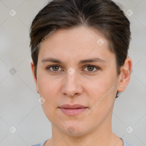 Joyful white young-adult female with short  brown hair and brown eyes