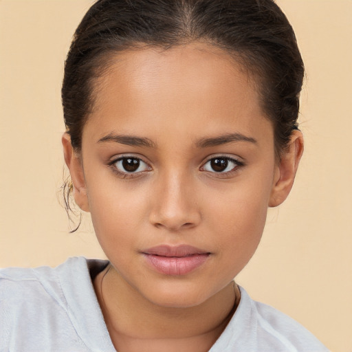 Joyful white child female with medium  brown hair and brown eyes