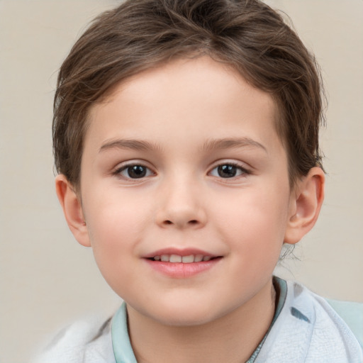 Joyful white child female with short  brown hair and brown eyes