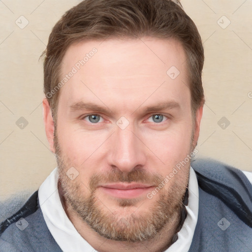 Joyful white adult male with short  brown hair and grey eyes