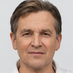 Joyful white middle-aged male with short  brown hair and brown eyes