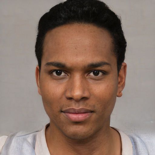 Neutral white young-adult male with short  black hair and brown eyes