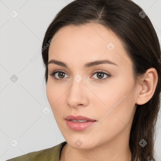 Neutral white young-adult female with long  brown hair and brown eyes