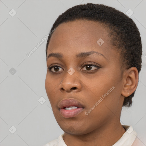 Neutral black young-adult female with short  black hair and brown eyes