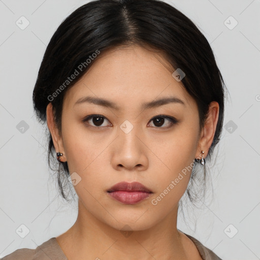 Neutral asian young-adult female with medium  brown hair and brown eyes