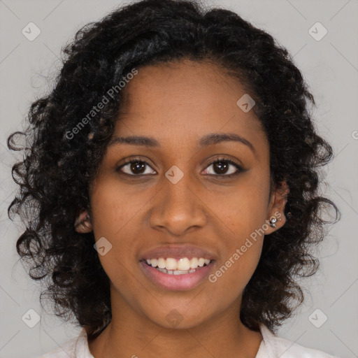 Joyful black young-adult female with medium  black hair and brown eyes