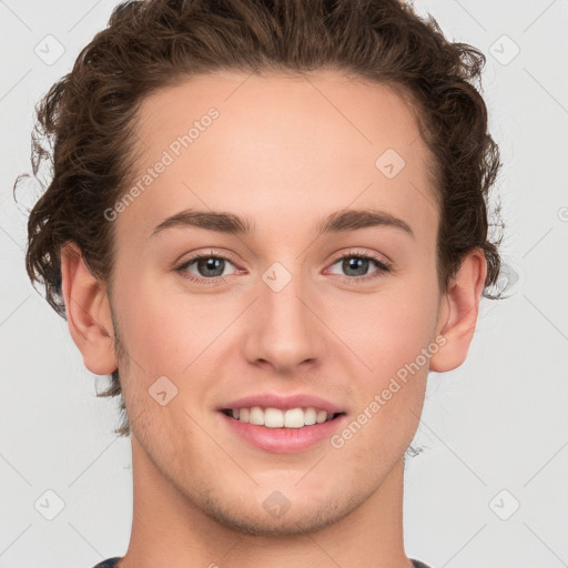 Joyful white young-adult female with short  brown hair and grey eyes