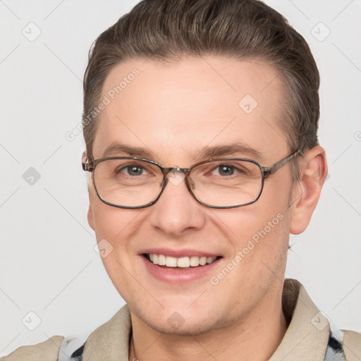 Joyful white adult female with short  brown hair and grey eyes