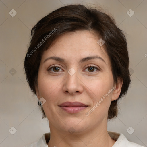 Joyful white adult female with medium  brown hair and brown eyes