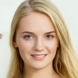 Joyful white young-adult female with long  brown hair and blue eyes